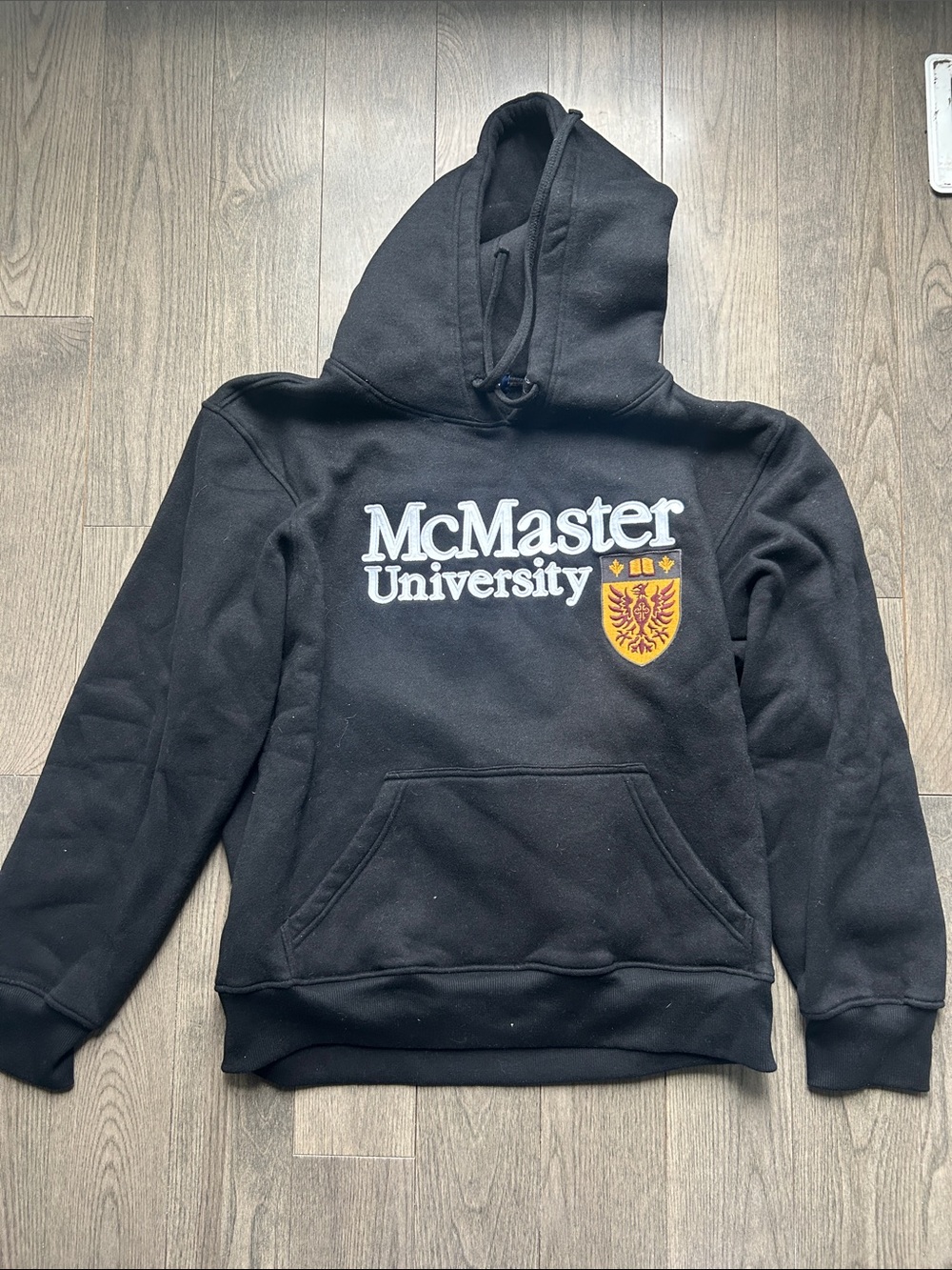 Varsity McMaster University Black Hoodie with Gold Crest